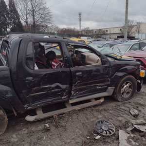 A destroyed car after a heavy accident - Sexton Weldon Law Firm.