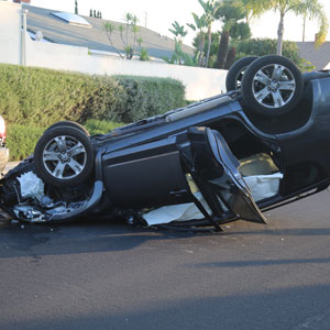 A car flipped over on its roof after an accident - Sexton Weldon Law Firm