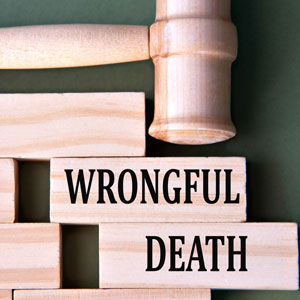 An image with the words wrongful death written multiple times in bold red font on a black background. - Sexton Weldon Law Firm